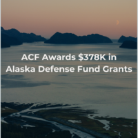 Announcement banner: ACF awards $378K in Alaska Defense Fund Grants over a coastal sunset scene with mountains and water in the background (text visible on image)